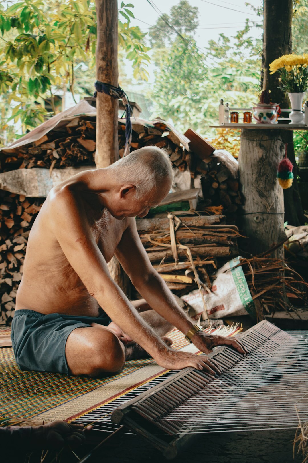 person reading book in village